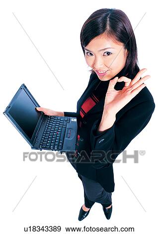 Stock Photo - standing, occupation, human cut outs, young adult, professional, praising, technology. Fotosearch