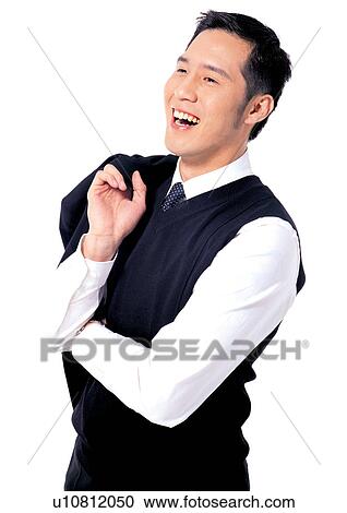 Stock Image - young adult, man only, executive, looking up, business executive. Fotosearch
