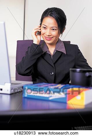 connectivity, sitting, asian ethnicity, cheerful, happy View Large Photo Image Stock Image - connectivity, sitting, asian ethnicity, cheerful, happy. Fotosearch