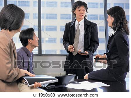 leisure activity, businesswoman, holding, asian ethnicity, togetherness, indoor, toothy smile View Large Photo Image Stock Image - leisure activity, businesswoman, holding, asian ethnicity, togetherness, indoor, toothy smile. Fotosearch