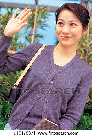 looking away, black hair, career, full sleeves, plants, glancing, waving View Large Photo Image Stock Image - looking away, black hair, career, full sleeves, plants, glancing, waving. Fotosearch