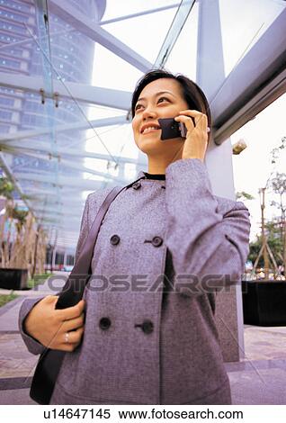 Stock Photography - one person, waist-up, asian ethnicity, career, young adult, professional, woman only. Fotosearch
