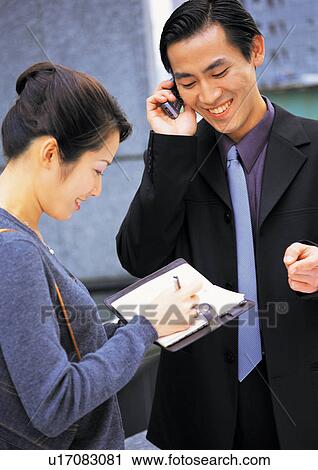 Stock Image - one young woman, one young man, formal, young adult. Fotosearch