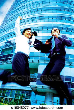 Stock Photo - people, jumping, excitement, rejoice, dressed, jump. Fotosearch