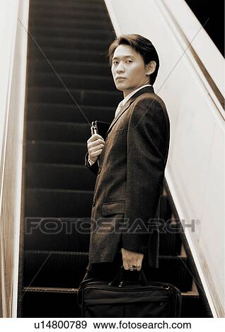 sepia, asian ethnicity, well dressed, business in asia, stepping, moving upward View Large Photo Image Stock Photo - sepia, asian ethnicity, well dressed, business in asia, stepping, moving upward. Fotosearch