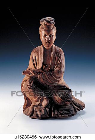 Stock Photograph - sitting, craft product, ethnic, representation, embellished, culture, close up. Fotosearch