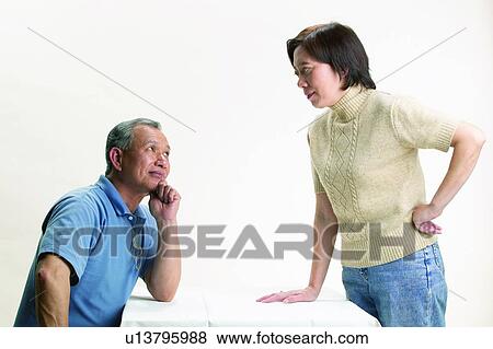 Stock Photo - Asian Ethnicity, Casual Clothing, Brown Hair, Adults Only. Fotosearch