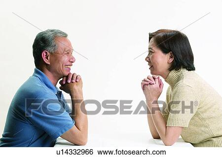Stock Photograph - Asian Ethnicity, Casual Clothing, Brown Hair, Adults Only. Fotosearch