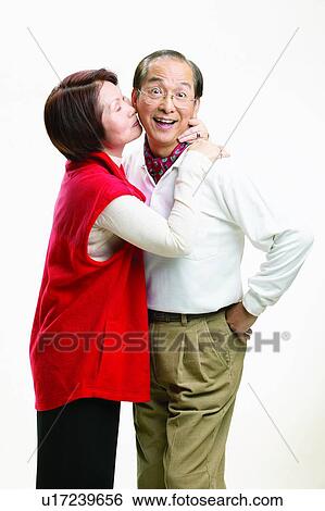 Stock Photograph - Asian Ethnicity, Casual Clothing, Brown Hair, Balding, Adults Only. Fotosearch