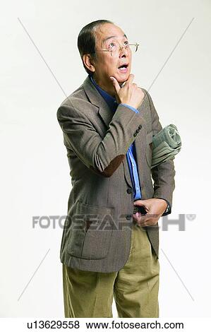 Stock Photo - Balding, Coat, Casual Clothing, Black Hair, Asian Ethnicity. Fotosearch