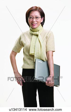 Brown Hair, Closed, Casual Clothing, Asian Ethnicity View Large Photo Image Picture - Brown Hair, Closed, Casual Clothing, Asian Ethnicity. Fotosearch