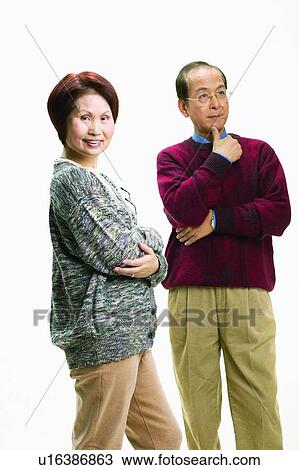 Cardigan, Arms Crossed, Brown Hair, Balding, Asian Ethnicity, Adults Only View Large Photo Image Stock Image - Cardigan, Arms Crossed, Brown Hair, Balding, Asian Ethnicity, Adults Only. Fotosearch