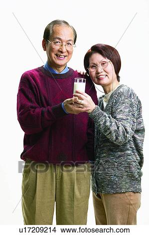 Cardigan, Asian Ethnicity, Brown Hair, Beverage, Balding, Adults Only View Large Photo Image Picture - Cardigan, Asian Ethnicity, Brown Hair, Beverage, Balding, Adults Only. Fotosearch
