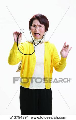 Picture - Doctor, Female Doctor, Indoor, Medical Equipment, Facial Expression. Fotosearch