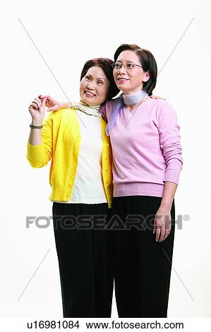 Picture - Holding Hands, Eyeglasses, Mature Women, Asian, Two People, Lifestyles, Arm Around. Fotosearch