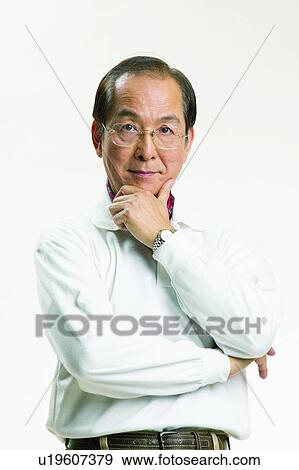 Stock Photo - Looking At Camera, Eyeglasses, Close-Up, Portrait, Black Hair. Fotosearch