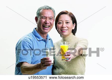 Looking At Camera, Indoor, Asian, Milk, Togetherness, Refreshment View Large Photo Image Stock Image - Looking At Camera, Indoor, Asian, Milk, Togetherness, Refreshment. Fotosearch