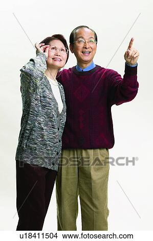 Sweater, Looking Up, Warm Clothing, Pants, Asian Ethnicity, Balding View Large Photo Image Picture - Sweater, Looking Up, Warm Clothing, Pants, Asian Ethnicity, Balding. Fotosearch