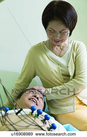 Stock Photo - Asian Ethnicity, Casual Clothing, Brown Hair, Black Hair, Adults Only. Fotosearch