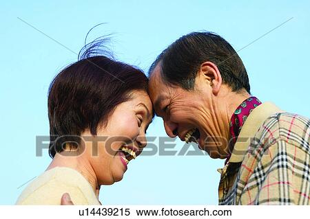 Stock Photography - Asian Ethnicity, Casual Clothing, Button Down Shirt, Brown Hair, Adults Only. Fotosearch