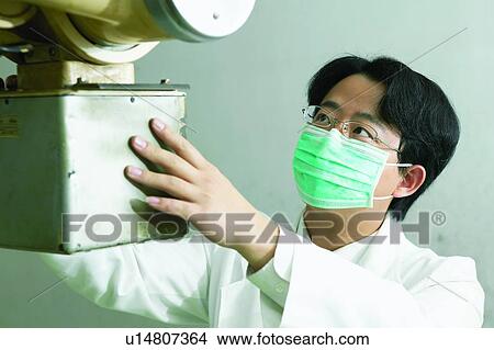 Picture - Black Hair, Doctor, Close-Up, Asian Ethnicity. Fotosearch