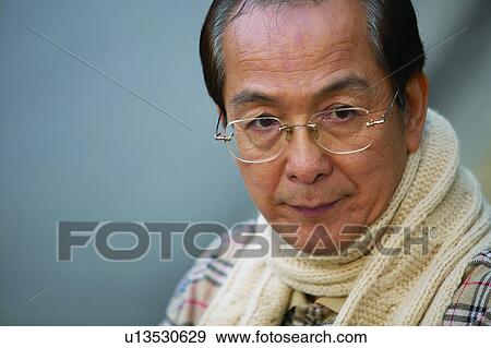 Stock Photo - Black Hair, Eyeglasses, Close-Up, Asian Ethnicity. Fotosearch
