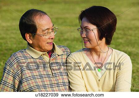 Brown Hair, Affectionate, Casual Clothing, Asian Ethnicity, Toothy Smile View Large Photo Image Stock Photo - Brown Hair, Affectionate, Casual Clothing, Asian Ethnicity, Toothy Smile. Fotosearch