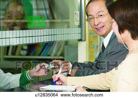 Picture - Businessmen, Close-Up, Business Suit, Asian Ethnicity, Enjoyment, Checkout Counter. Fotosearch