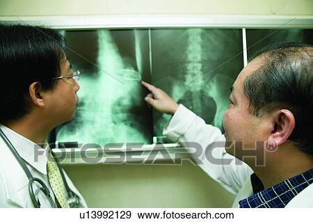 Care, Golden Years, Lab Coat, Standing, Gray Hair, Professional Occupation View Large Photo Image Stock Photo - Care, Golden Years, Lab Coat, Standing, Gray Hair, Professional Occupation. Fotosearch