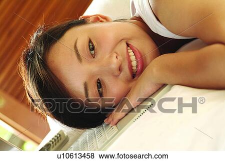 Bed, Close-Up, Brown Hair, Bedroom, Asian Ethnicity View Large Photo Image Stock Photo - Bed, Close-Up, Brown Hair, Bedroom, Asian Ethnicity. Fotosearch