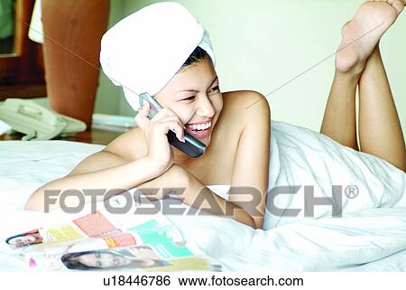 Cheerful, Home Truths, Connection, Technology, Lying Down, Lying On Front View Large Photo Image Stock Photograph - Cheerful, Home Truths, Connection, Technology, Lying Down, Lying On Front. Fotosearch