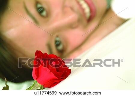 Stock Photo - Close-Up, Focus On Foreground, Flower, Asian Ethnicity. Fotosearch