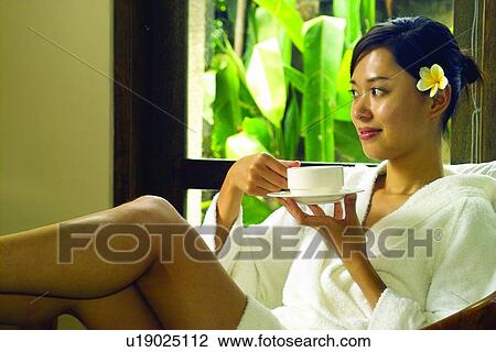 Cup, Happiness, Brown Hair, One Young Woman Only, Lifestyles View Large Photo Image Stock Image - Cup, Happiness, Brown Hair, One Young Woman Only, Lifestyles. Fotosearch