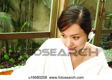 Indoor, Lifestyles, Glass, One Person, Bathrobe, Listening View Large Photo Image Stock Photo - Indoor, Lifestyles, Glass, One Person, Bathrobe, Listening. Fotosearch
