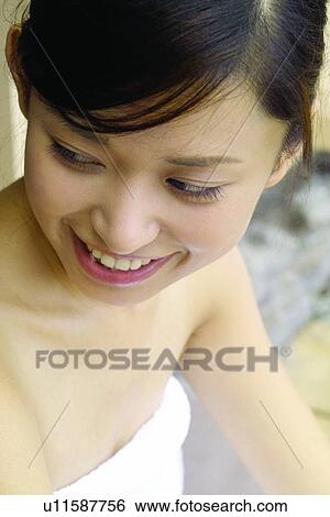 Stock Photograph - Lifestyles, Focus On Foreground, Head And Shoulders, Toothy Smile. Fotosearch