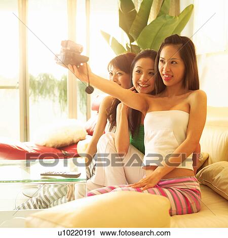 Stock Image - Asian Ethnicity, Casual Clothing, Brown Hair, Adults Only. Fotosearch