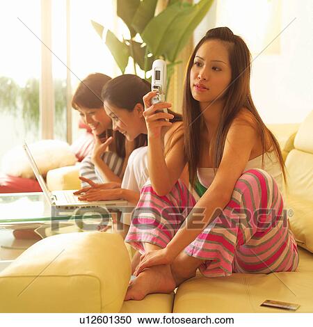 Asian Ethnicity, Casual Clothing, Brown Hair, Barefoot, Adults Only View Large Photo Image Stock Image - Asian Ethnicity, Casual Clothing, Brown Hair, Barefoot, Adults Only. Fotosearch
