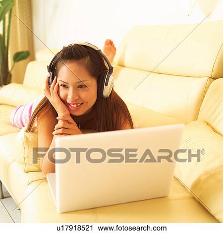 Barefoot, Cheerful, Casual Clothing, Brown Hair, Asian Ethnicity View Large Photo Image Stock Image - Barefoot, Cheerful, Casual Clothing, Brown Hair, Asian Ethnicity. Fotosearch