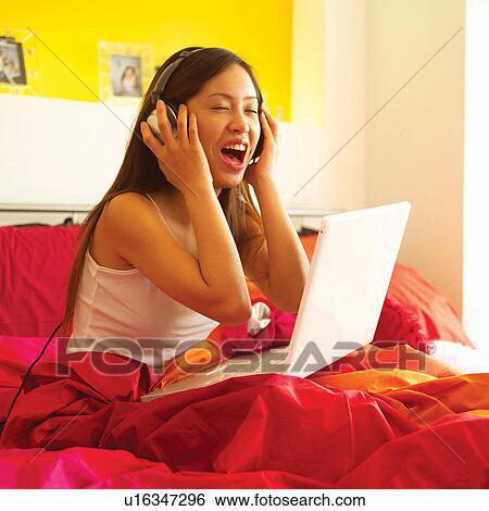 Bed, Brown Hair, Bedroom, Bedding, Asian Ethnicity View Large Photo Image Stock Photograph - Bed, Brown Hair, Bedroom, Bedding, Asian Ethnicity. Fotosearch