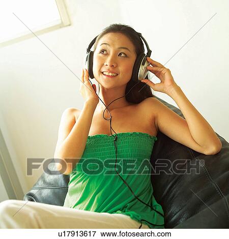 Stock Photo - Black Hair, Casual Clothing, Asian Ethnicity. Fotosearch