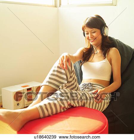 Stock Photo - Brown Hair, Cheerful, Casual Clothing, Asian Ethnicity. Fotosearch