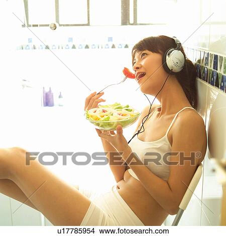 Picture - Brown Hair, Mouth Open, Headphones, Looking Up, Fun. Fotosearch