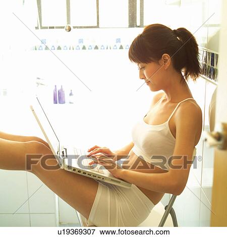 Chair, Female, Technology, One Young Woman Only, Business, Indoor View Large Photo Image Stock Photo - Chair, Female, Technology, One Young Woman Only, Business, Indoor. Fotosearch