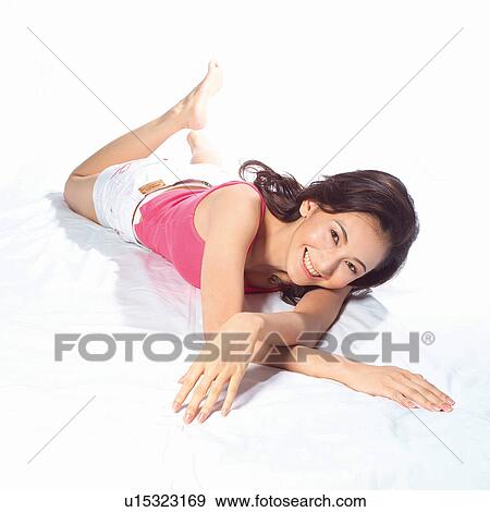 Stock Photo - Female, One Person, Teenage Girl, Portrait, Barefoot, Smiling. Fotosearch