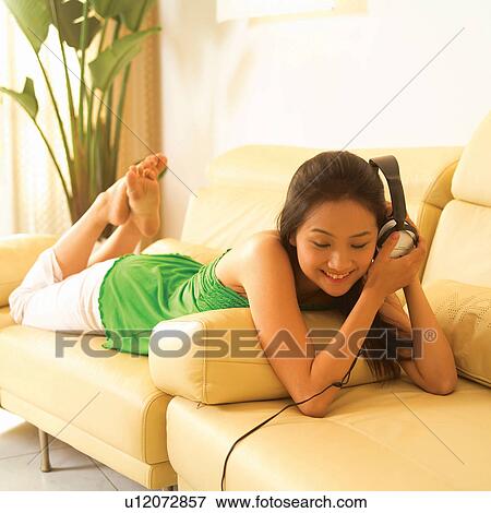 Leisure Activity, Day, Young Adult, Holding, Lifestyles, Legs Crossed At Ankle, Potted Plant View Large Photo Image Stock Photo - Leisure Activity, Day, Young Adult, Holding, Lifestyles, Legs Crossed At Ankle, Potted Plant. Fotosearch