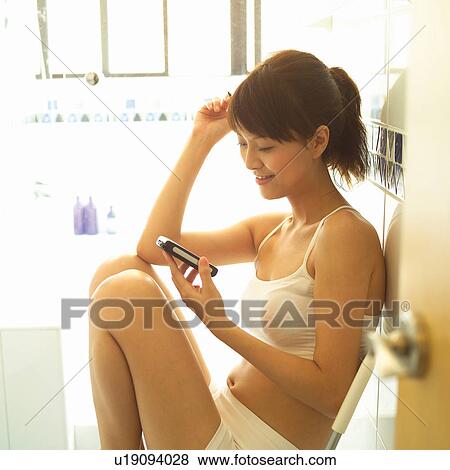 One Young Woman Only, Toothy Smile, Female, Looking Down, Woman View Large Photo Image Stock Photo - One Young Woman Only, Toothy Smile, Female, Looking Down, Woman. Fotosearch