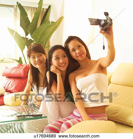 Stock Photo - Self Portrait, In This Life, Sitting, Three People, Home Interior. Fotosearch