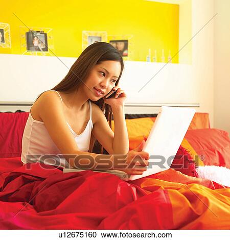 Teenage Girl, Indoor, Holding, Woman, Pillow, Looking Down, Home Interior View Large Photo Image Stock Image - Teenage Girl, Indoor, Holding, Woman, Pillow, Looking Down, Home Interior. Fotosearch