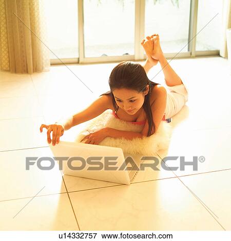 Woman, Youth Culture, One Person, Asian Ethnicity, Technology View Large Photo Image Stock Photo - Woman, Youth Culture, One Person, Asian Ethnicity, Technology. Fotosearch
