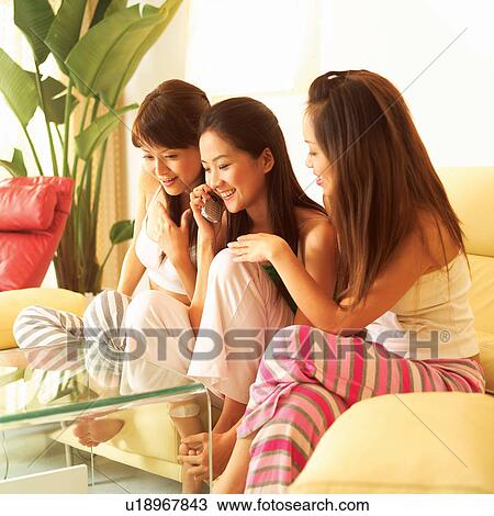 Women, Long Hair, Day, Three-Quarter Length, Mobile Phone, Smiling, Talking View Large Photo Image Stock Image - Women, Long Hair, Day, Three-Quarter Length, Mobile Phone, Smiling, Talking. Fotosearch